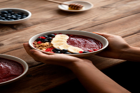 A person eating a delicious acai bowls